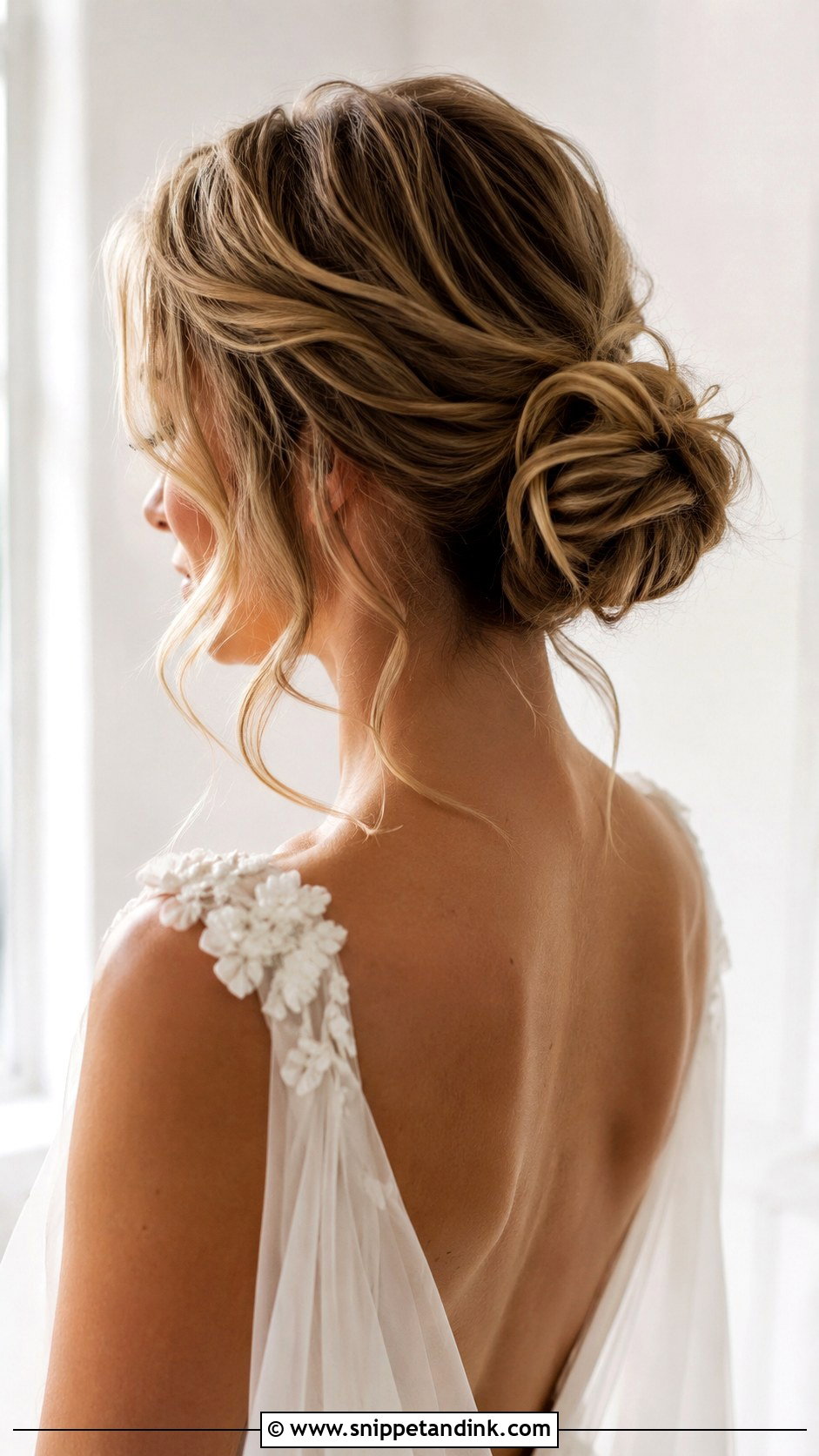 Mid Bun With Face Framing Pieces - Snippet and Ink - 20 Mid Bun Wedding Hair Ideas