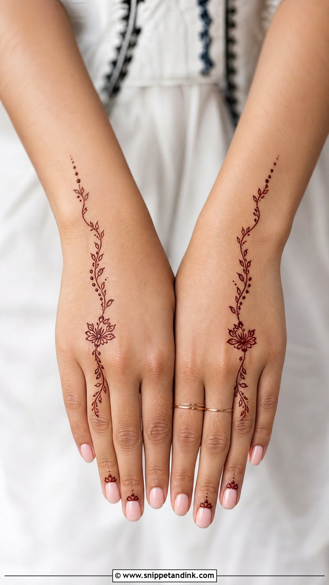 Minimal Back Hand Mehndi Design - Snippet and Ink - 35 Stylish Back Hand Mehndi Designs