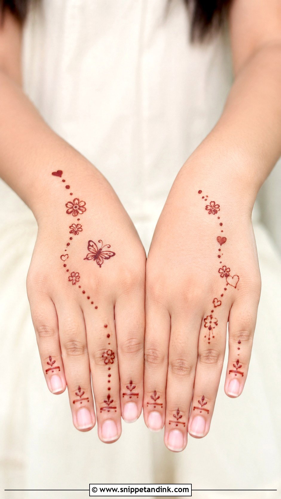 Minimal Back Hand Mehndi Design For Kids - Snippet and Ink - 30 Modern Minimal Back Hand Mehndi Designs