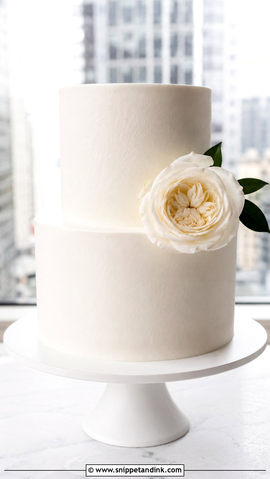 Minimal Buttercream Wedding Cake With Single Flower - Snippet and Ink - 20 Simple Buttercream Wedding Cake Designs