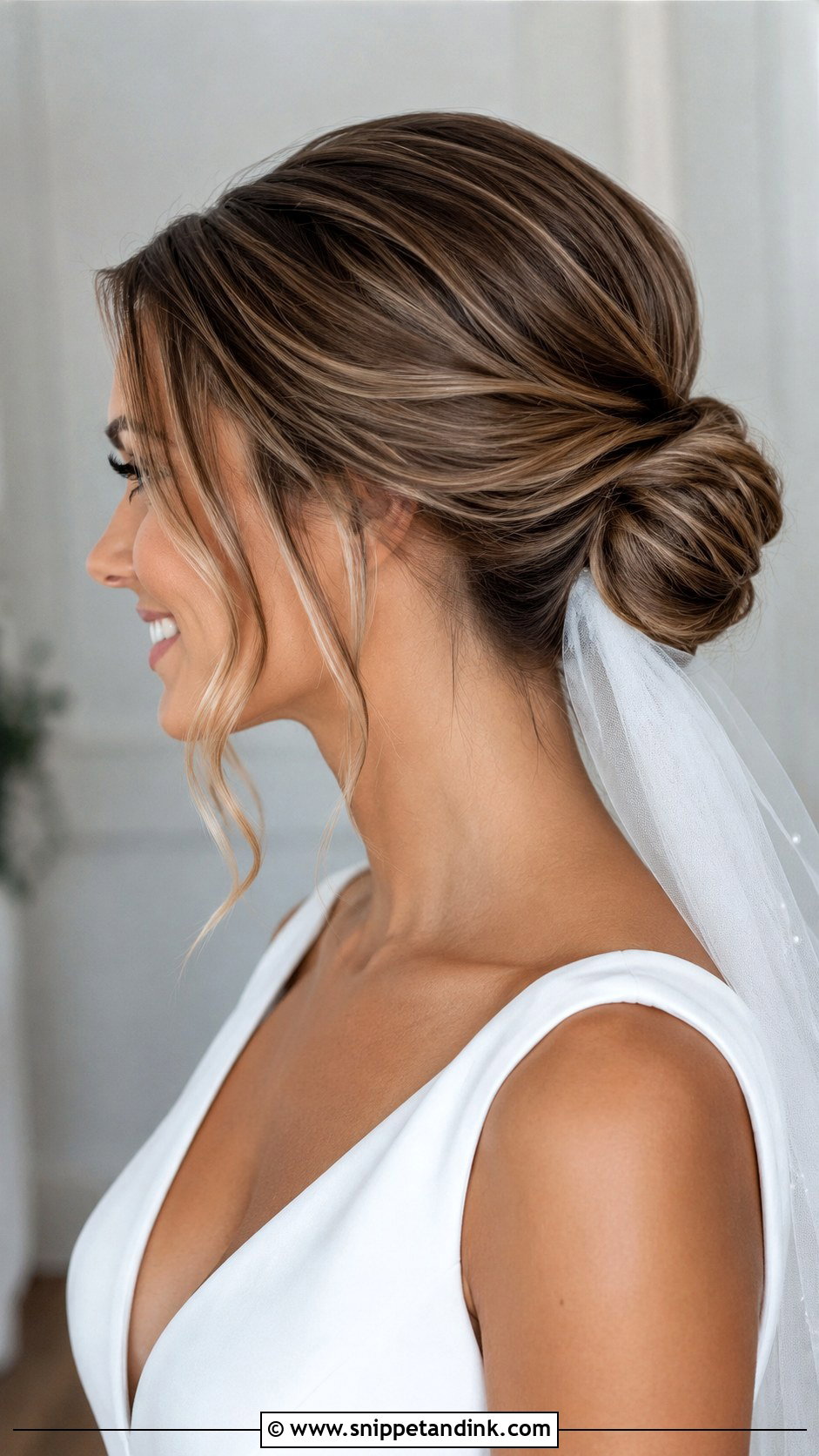 Modern Low Bun With Under Veil Placement - Snippet and Ink - 25 Updo with Veil Ideas