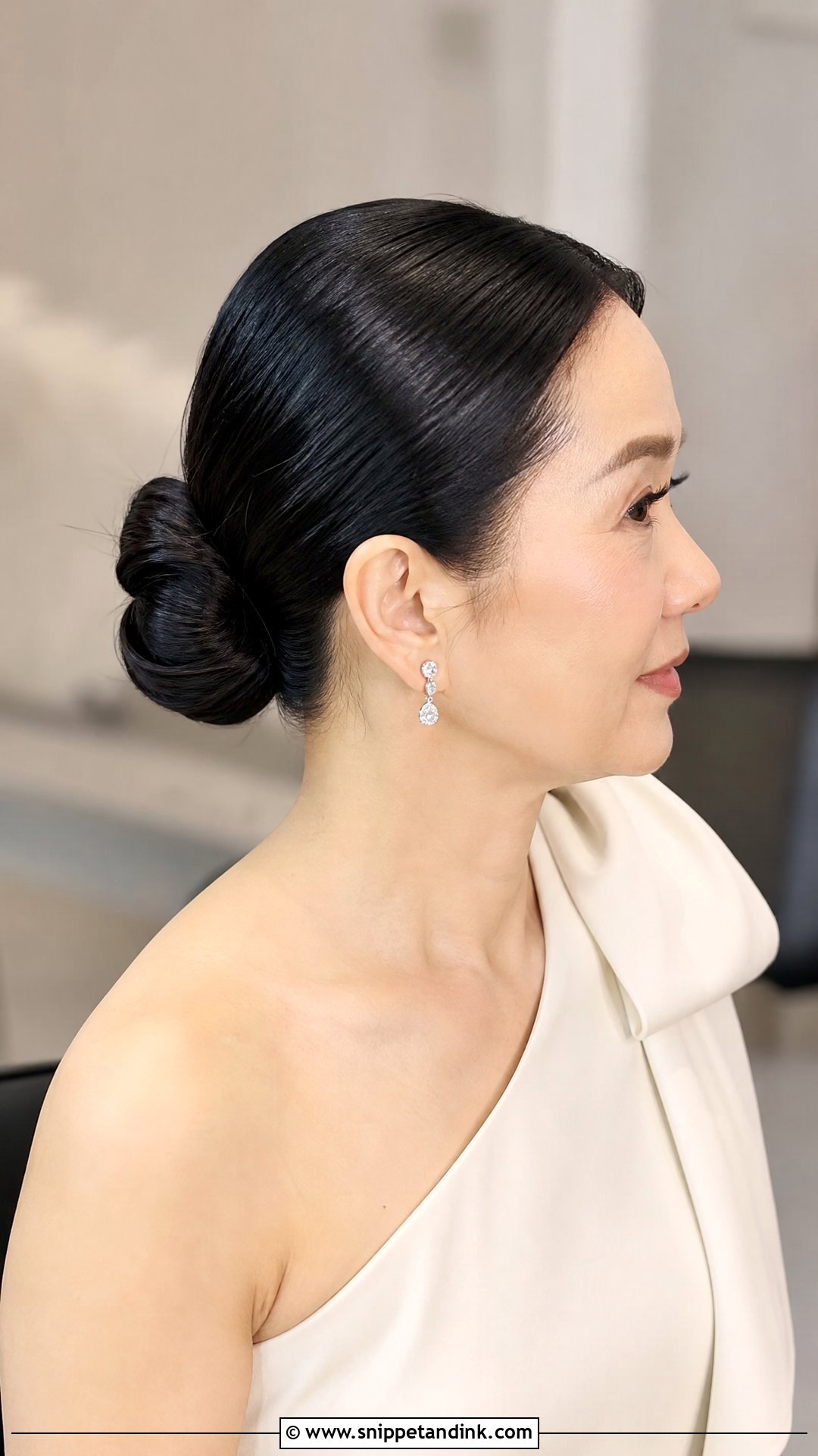 Mother Of The Bride Sleek Low Bun - Snippet and Ink - 20 Mother of the Bride Hairstyles