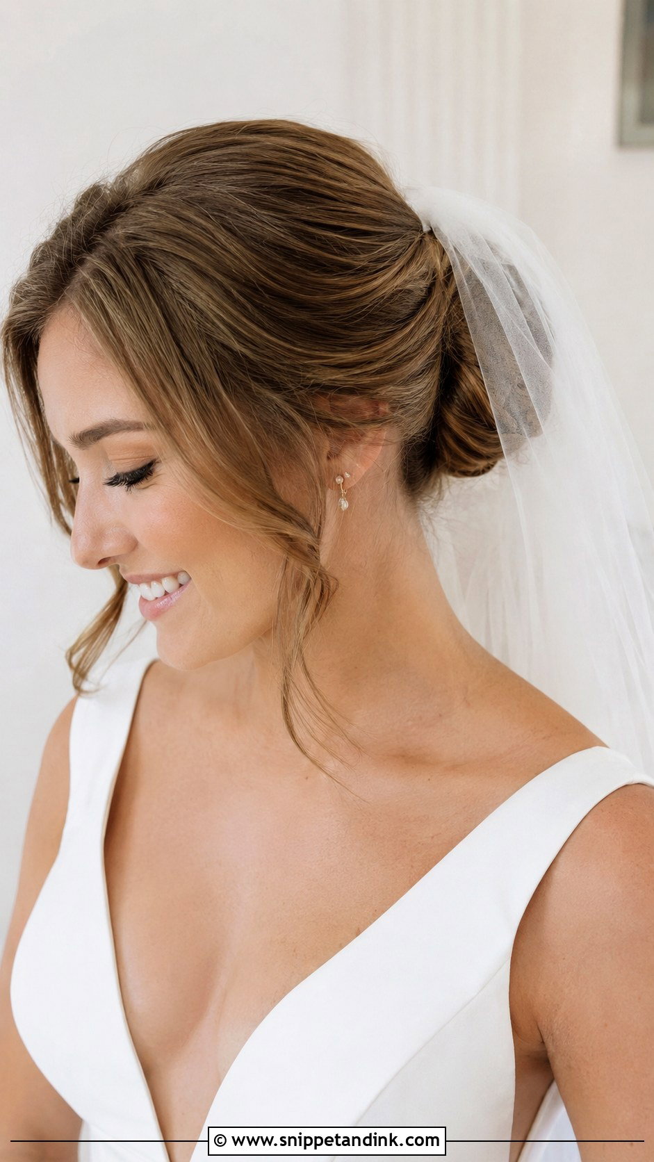 Natural Wedding Bun With Veil - Snippet and Ink - 15 Natural Wedding Hairstyle Ideas