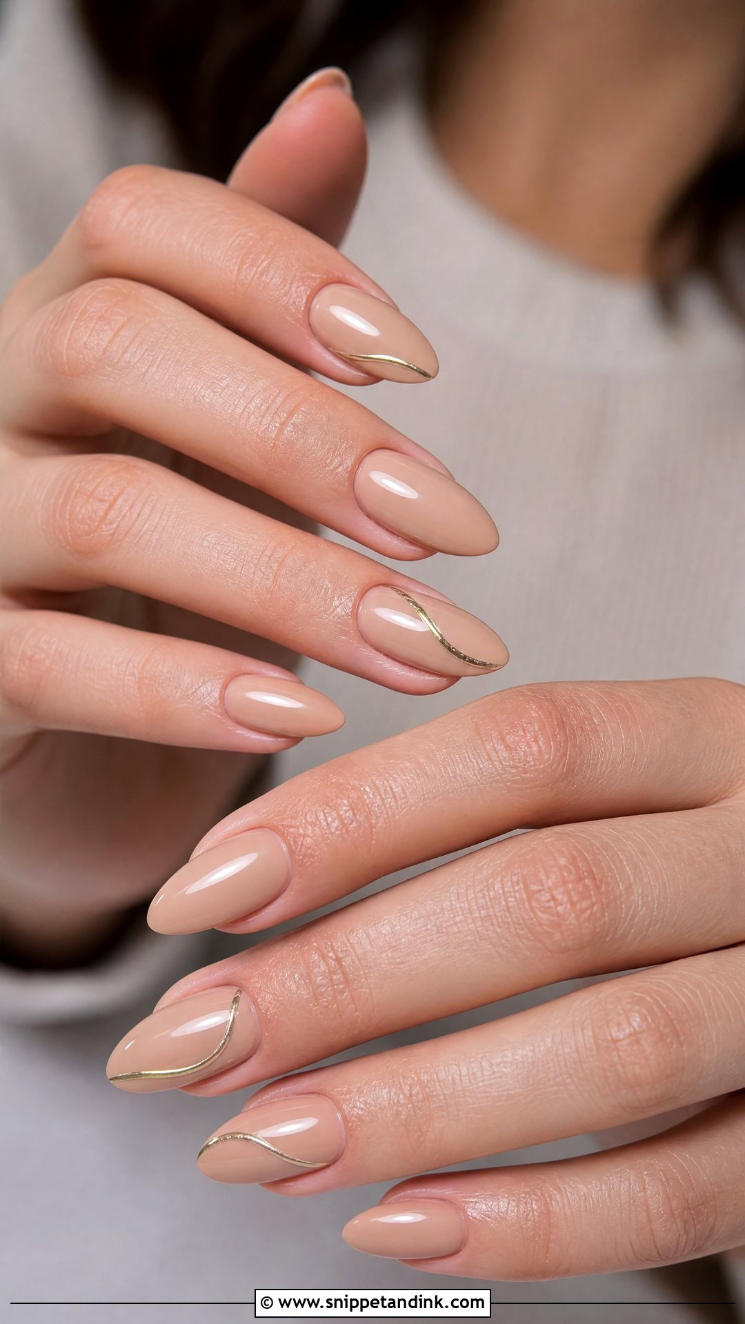 Nude Almond Nails With Gold Accent - Snippet and Ink - 25 Wedding Guest Nail Inspo Ideas