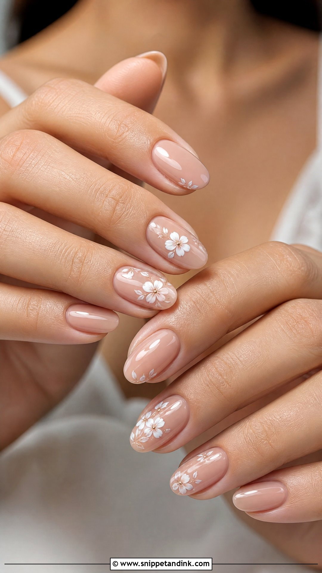 Nude Bridal Nails With White Flowers - Snippet and Ink - 25 Bridal Nail Art Designs