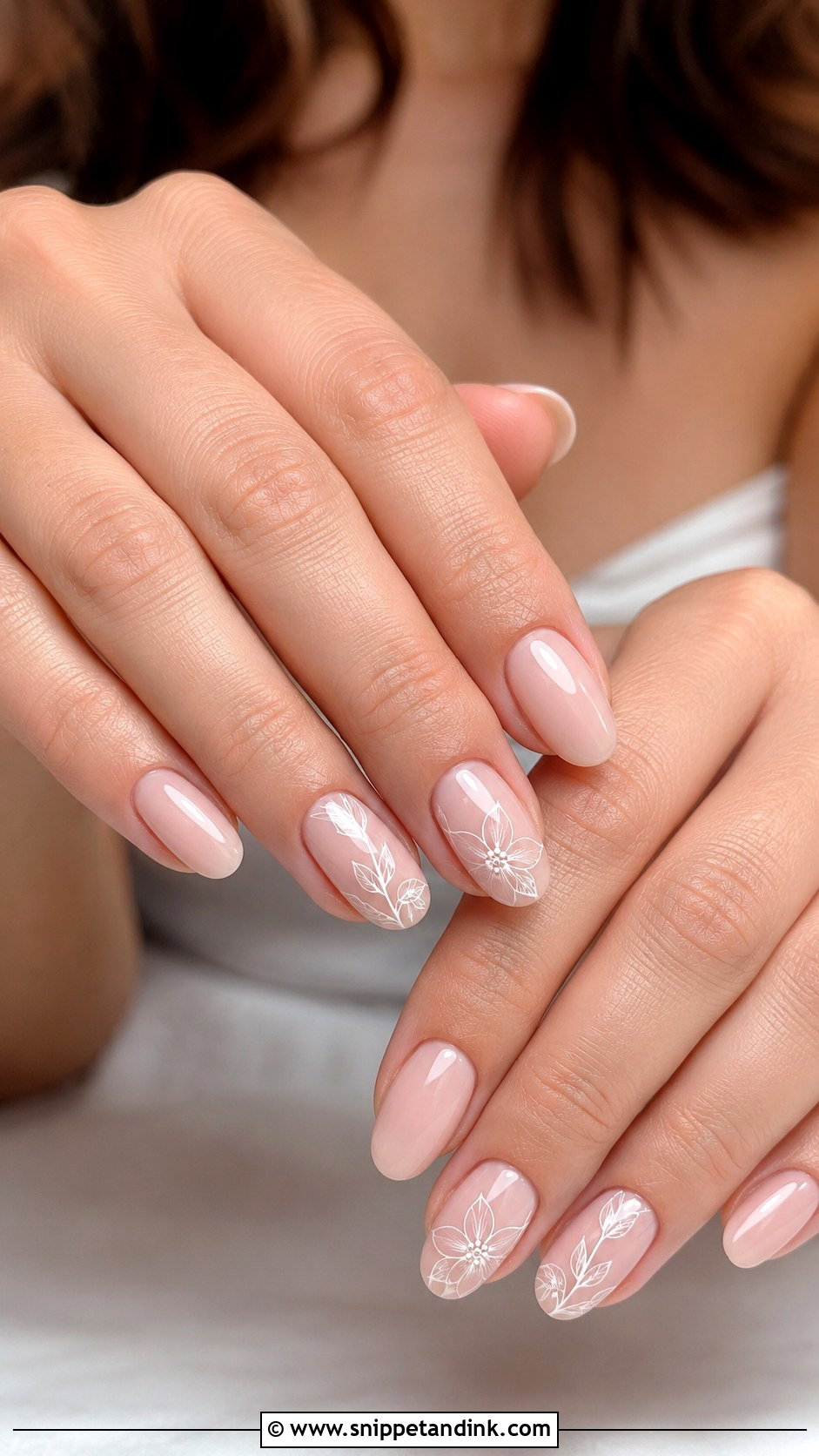Nude Nails With White Floral Art - Snippet and Ink - 30 Classy Wedding Guest Nails Ideas