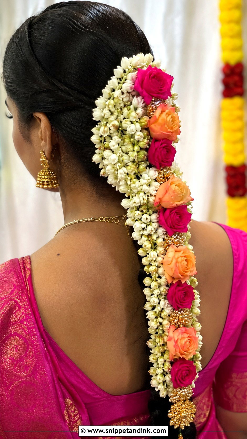Open Hair With Flower Tuck - Snippet and Ink - 25 South Indian Bride Engagement Hairstyle Ideas