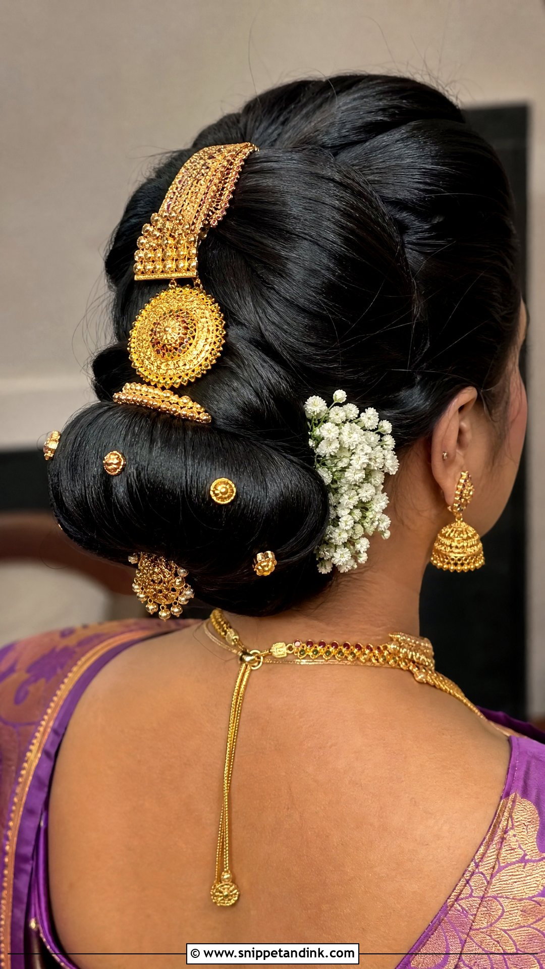 Ornamental Bun With Gold Accessories - Snippet and Ink - 20 Tamil Bridal Hairstyles