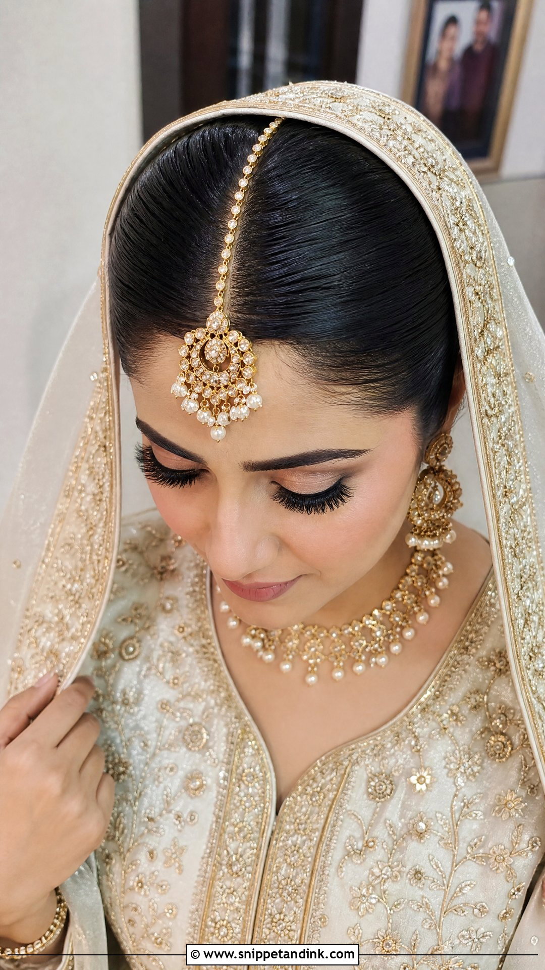 Pakistani Center Part Bridal Bun - Snippet and Ink - 20 Pakistani Front Hair Styles for Wedding