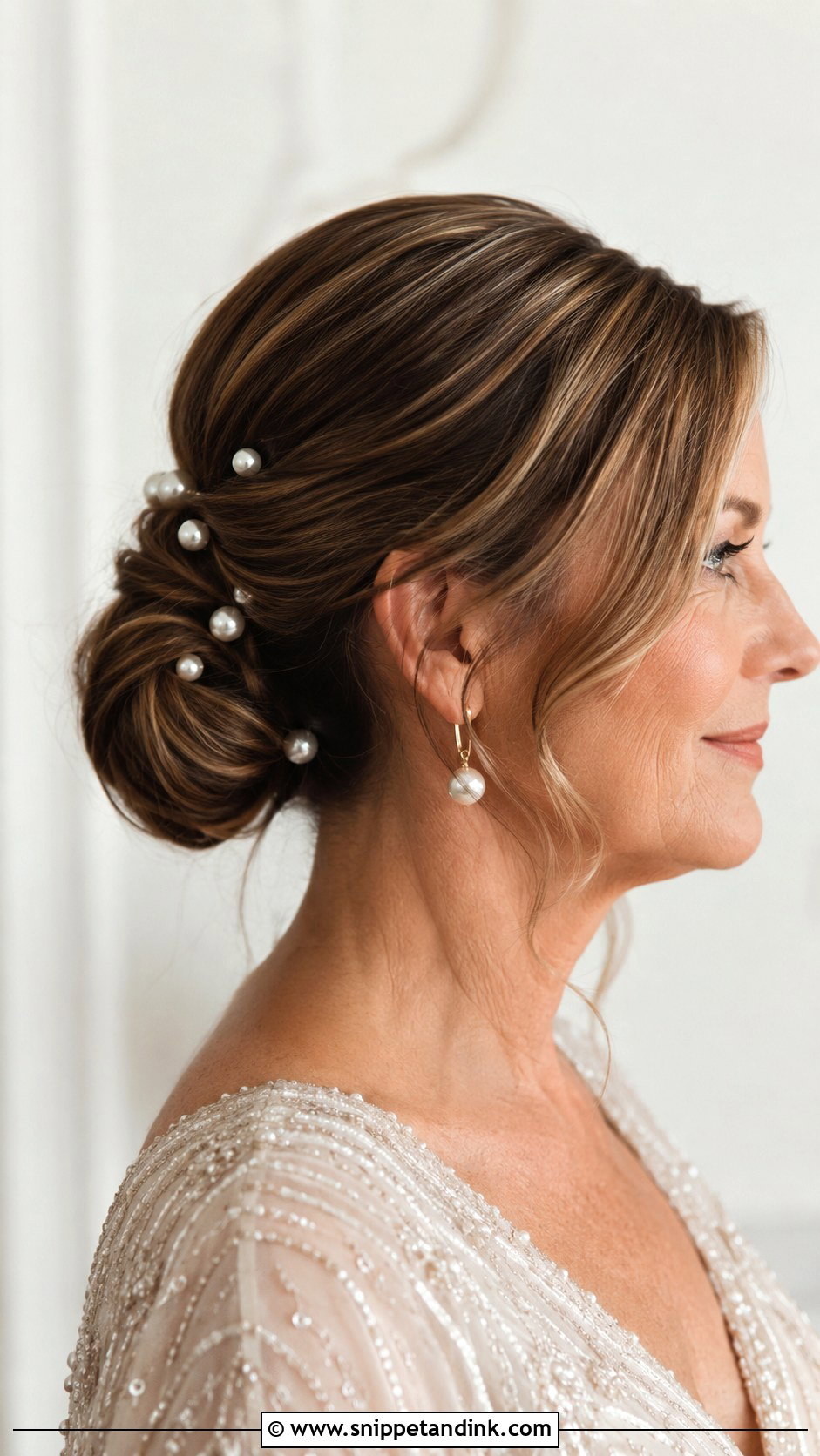 Pearl Accented Bun for Mother of the Bride - Snippet and Ink - 25 Wedding Hair for Mother of the Bride Ideas