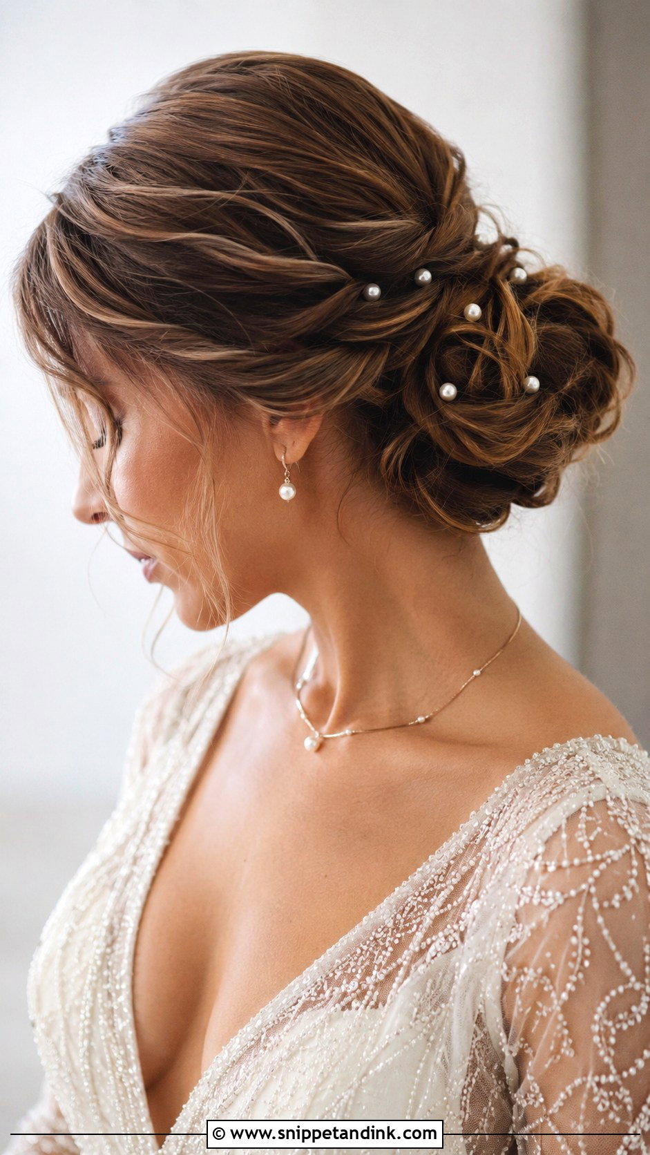 Pearl Accented Updo - Snippet and Ink - 25 Glam Wedding Hair Ideas