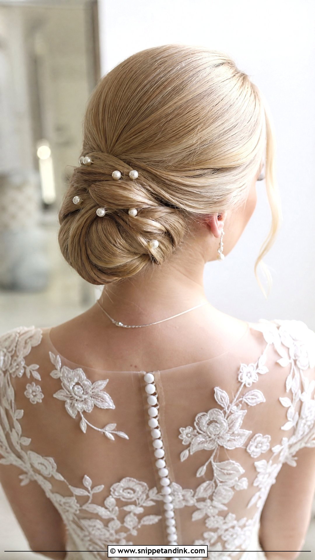 Pearl Adorned Bridal Bun - Snippet and Ink - 20 Lauren Kyle Wedding Hair Ideas