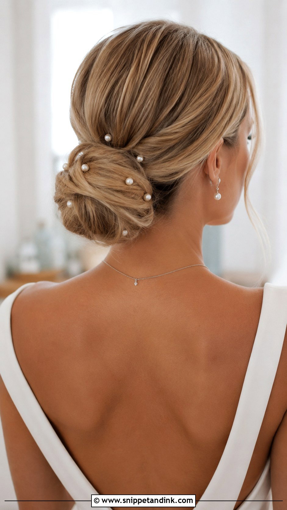 Pearl Adorned Chignon Updo - Snippet and Ink - 20 Elegant Updo Wedding Hairstyles