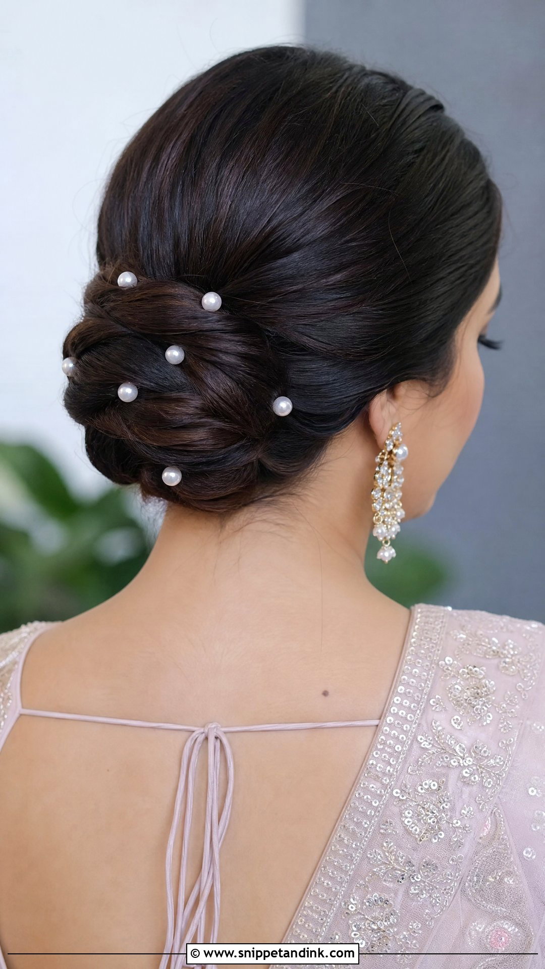 Pearl Embellished Chignon - Snippet and Ink - 20 Indian Hairstyle for Wedding Guest Ideas
