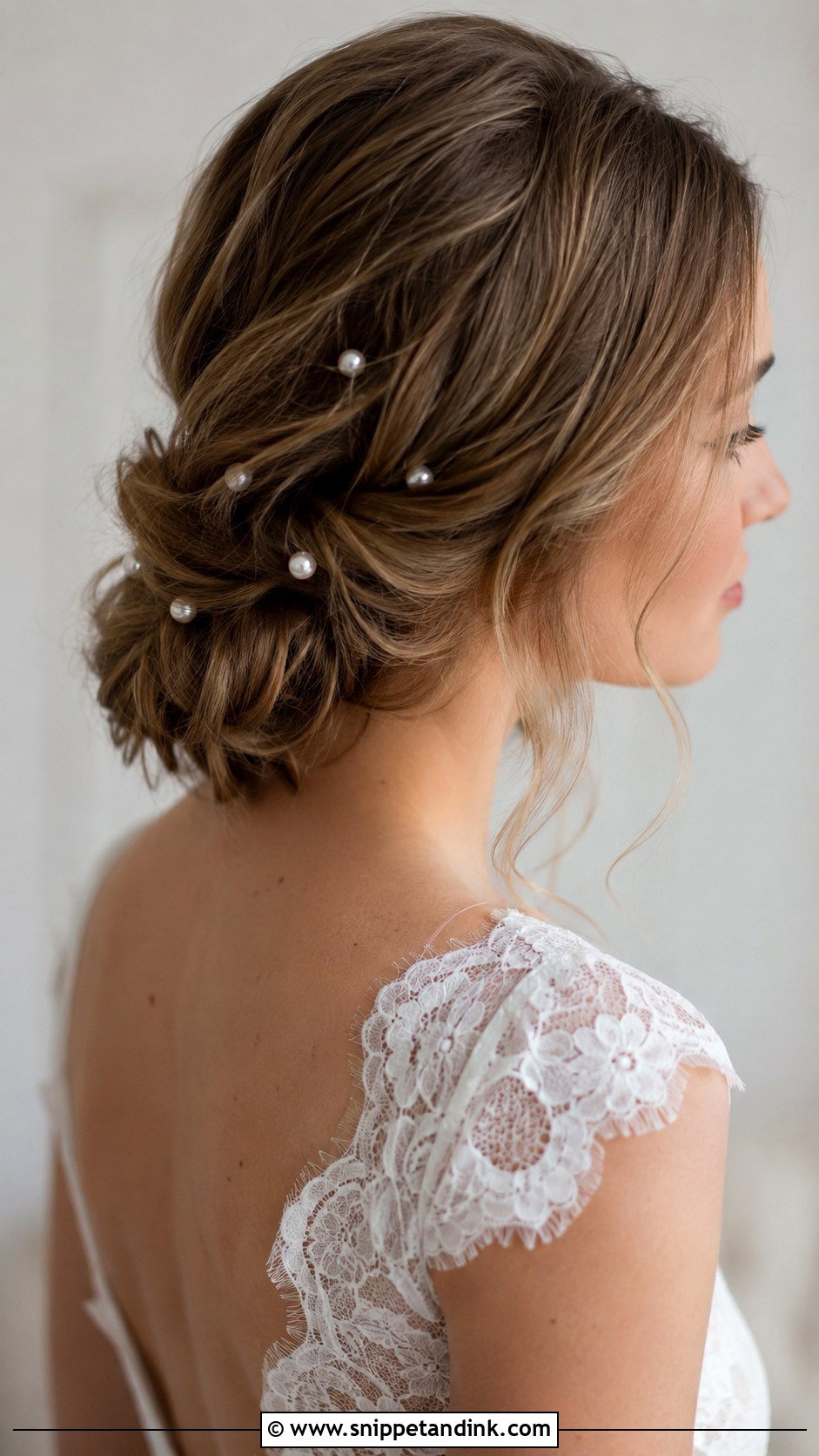 Pearl Scattered Low Bun - Snippet and Ink - 20 Pearl Bridal Hair Ideas