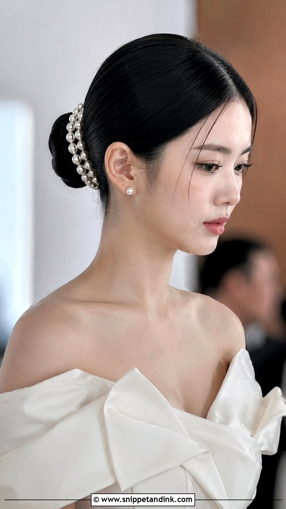Pearl Sleek Middle Part Bun - Snippet and Ink - 25 Bridal Hair with Pearls Ideas