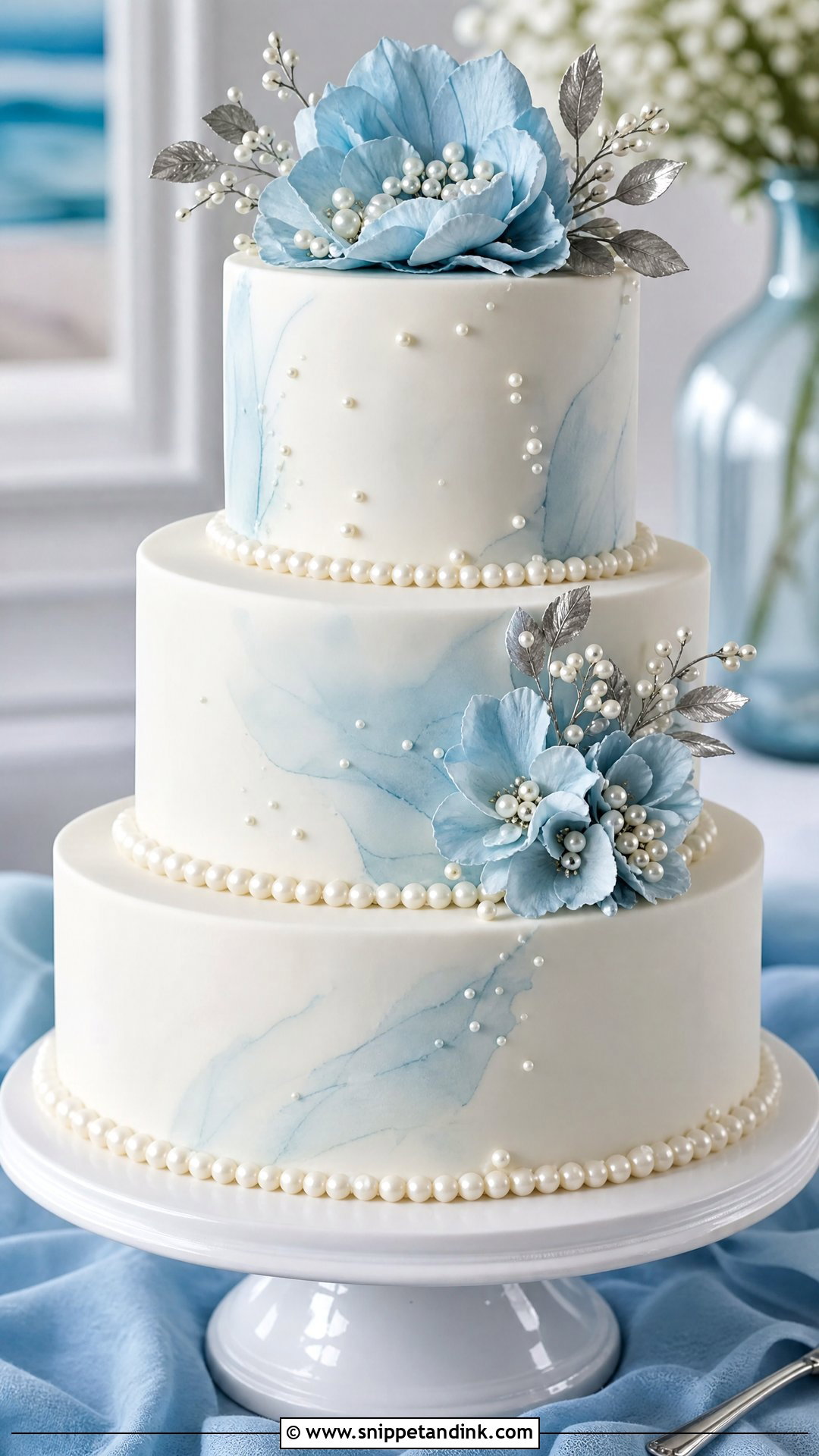 Pearl Wedding Cake With Blue Details - Snippet and Ink - 20 Pearl Wedding Cake Ideas
