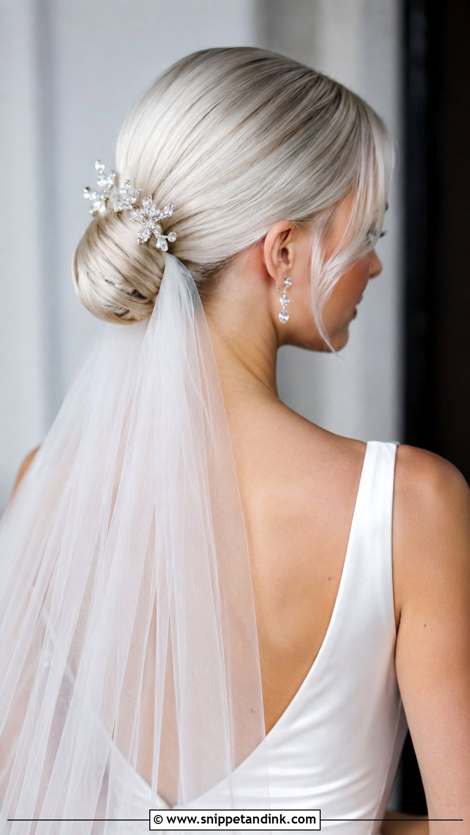 Platinum Blonde Low Bun - Snippet and Ink - 25 Blonde Wedding Hair Ideas