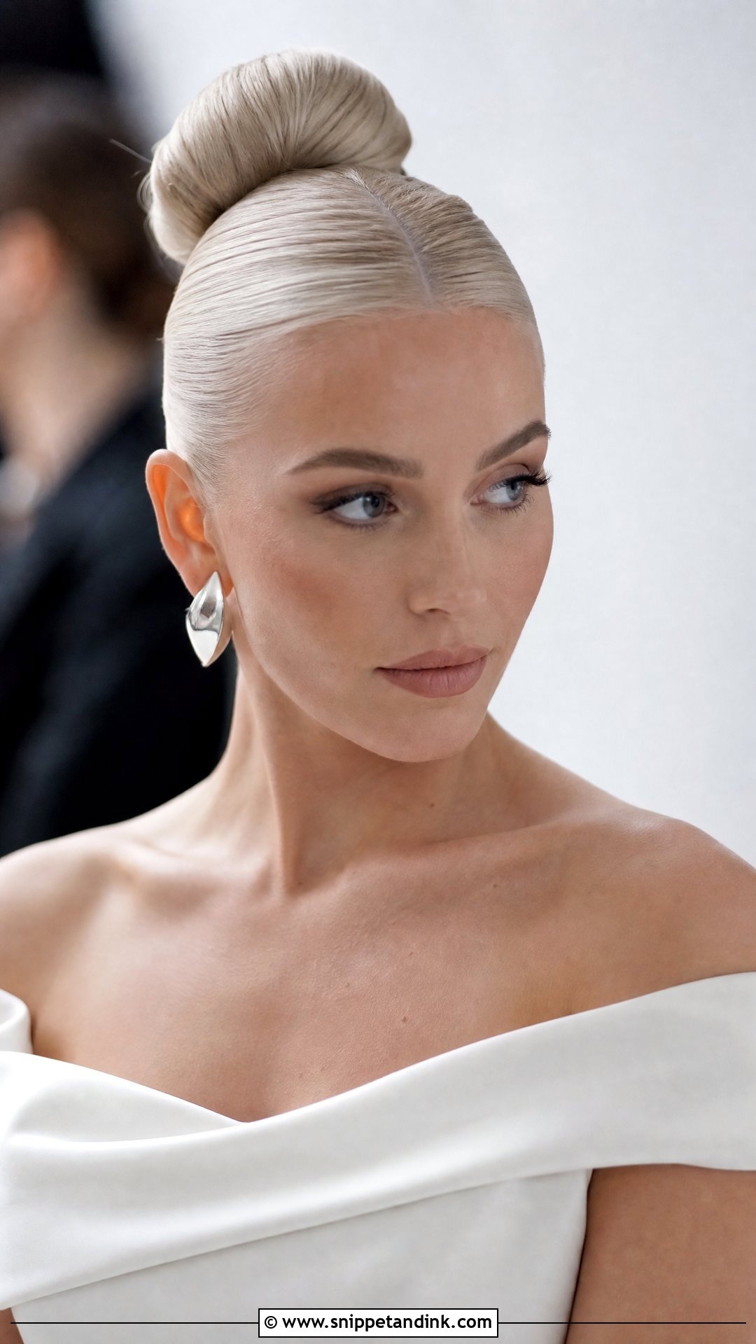 Platinum Blonde Sleek Ballerina Bun - Snippet and Ink - 20 Blonde Hair Bride Ideas