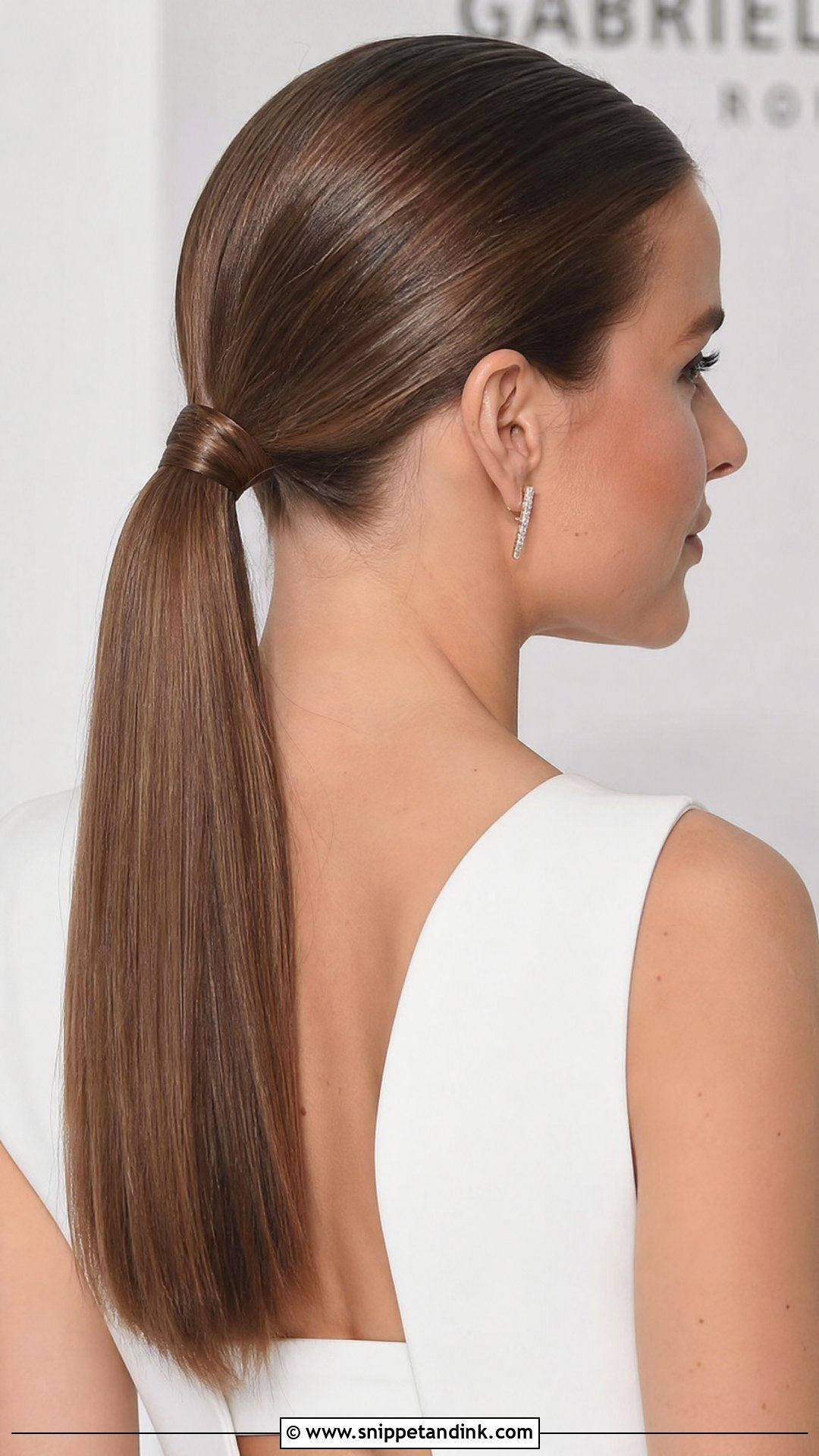Polished Low Ponytail - Snippet and Ink - 20 Wedding Guest Hairstyles 2025