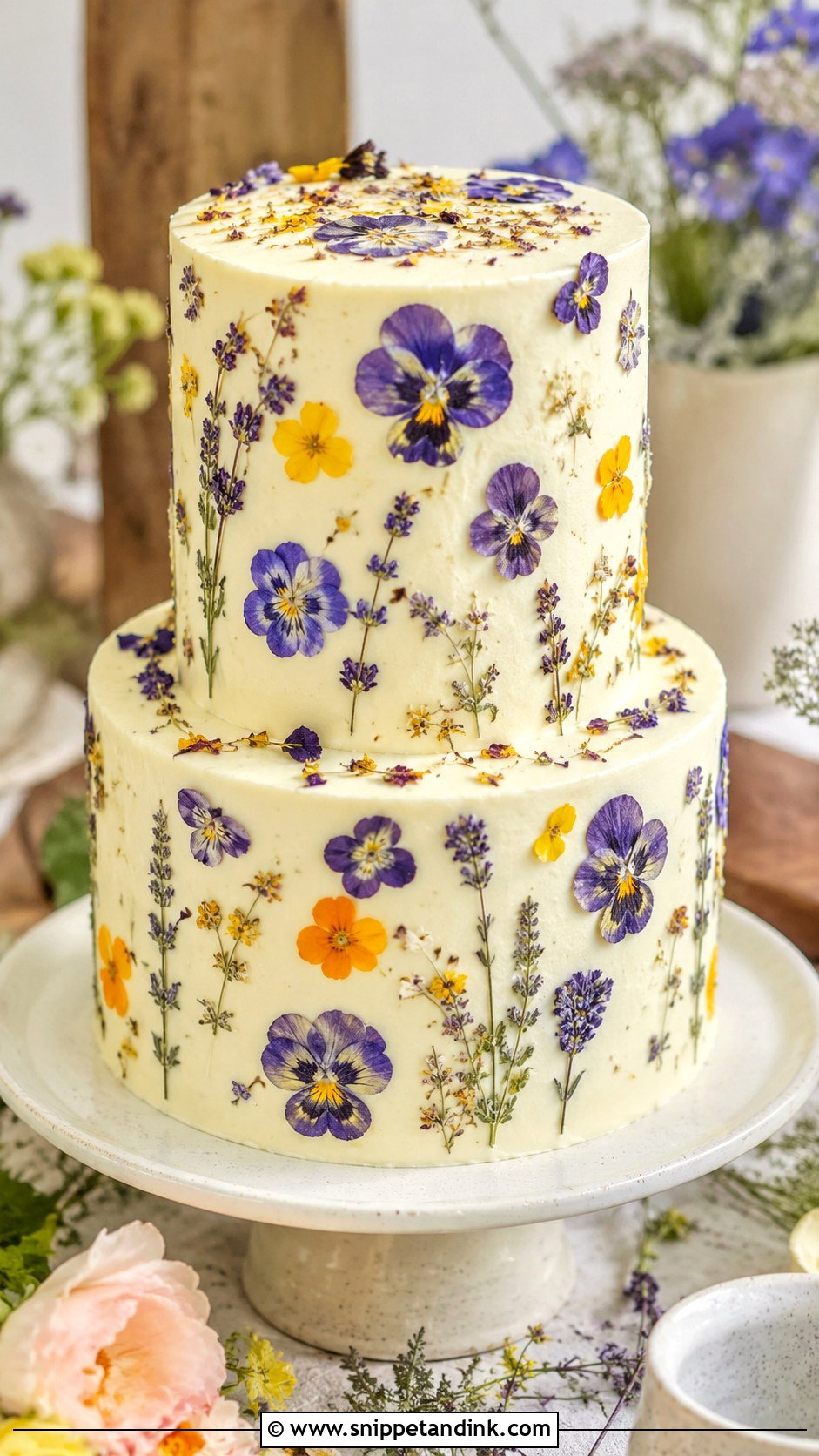 Purple And Yellow Pressed Flower Wedding Cake - Snippet and Ink - 20 Purple and Yellow Wedding Cake Ideas