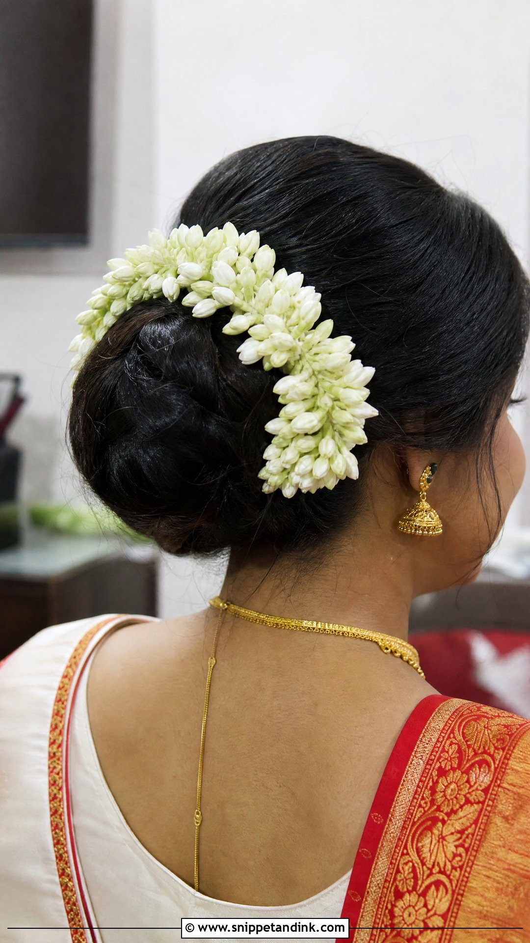 Rajnigandha Wrapped Bun - Snippet and Ink - 20 Bengali Bridal Hairstyle Ideas