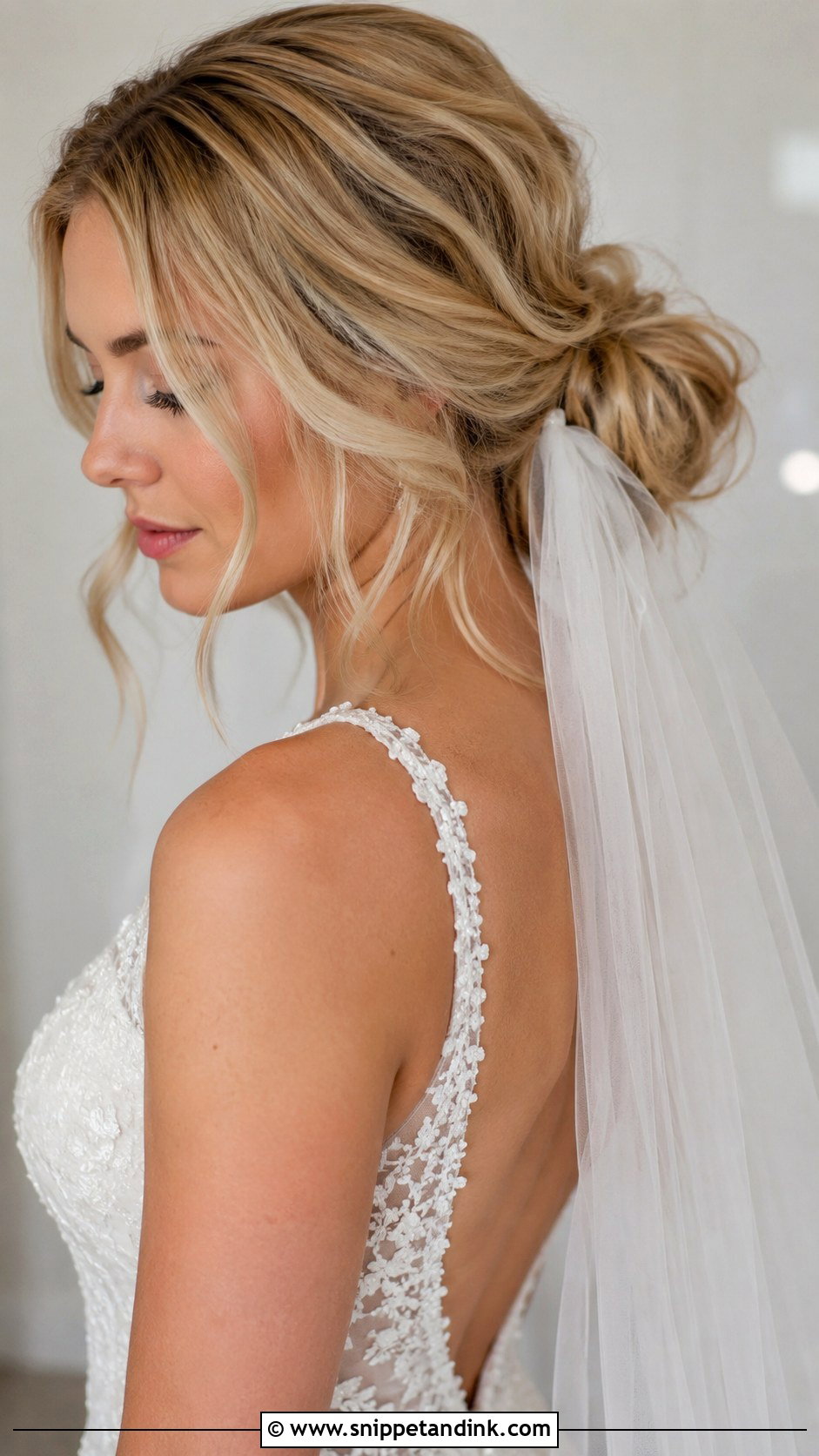 Romantic Loose Bun With Veil - Snippet and Ink - 25 Bridal Hair Bun Ideas