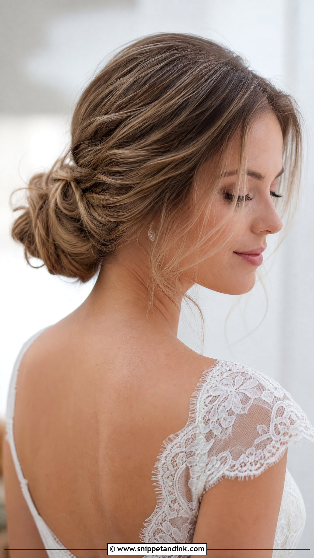 Romantic Low Bun With Face Framing Layers - Snippet and Ink - 20 Wedding Hairstyles for Layered Hair