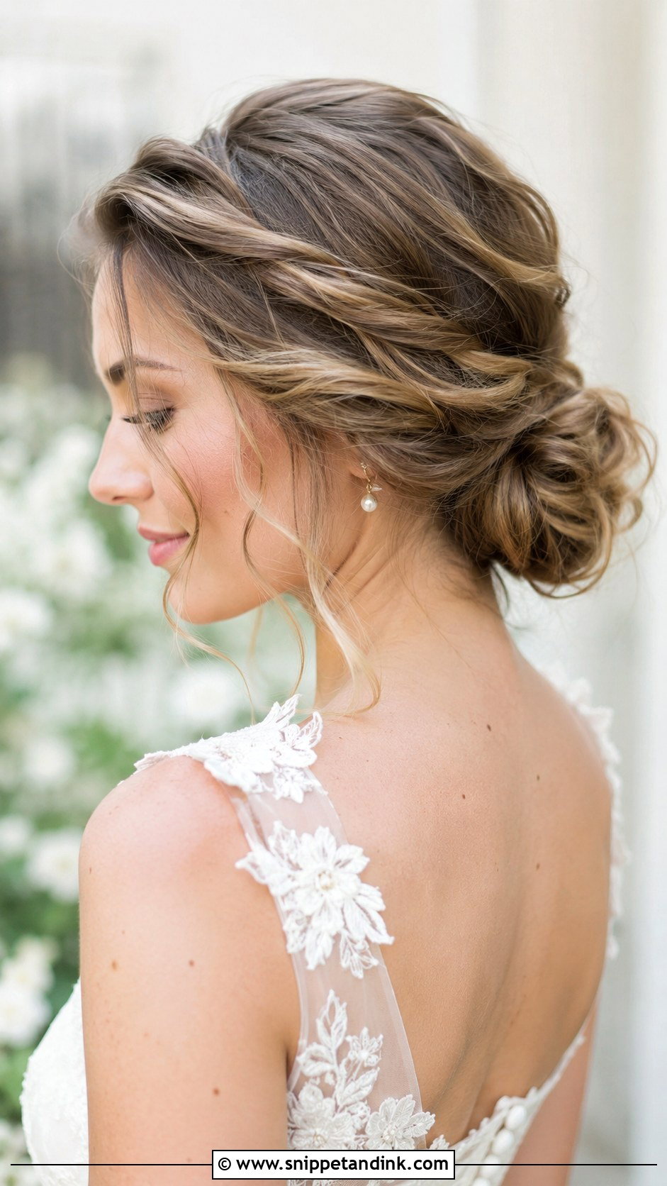 Romantic Low Bun With Loose Waves - Snippet and Ink - 20 Sophia Richie Wedding Hair Ideas