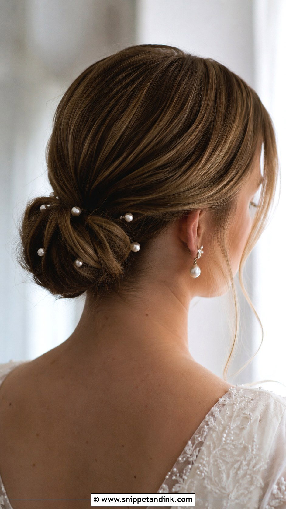 Romantic Low Bun With Pearls - Snippet and Ink - 20 Short Hair Bun Wedding Ideas