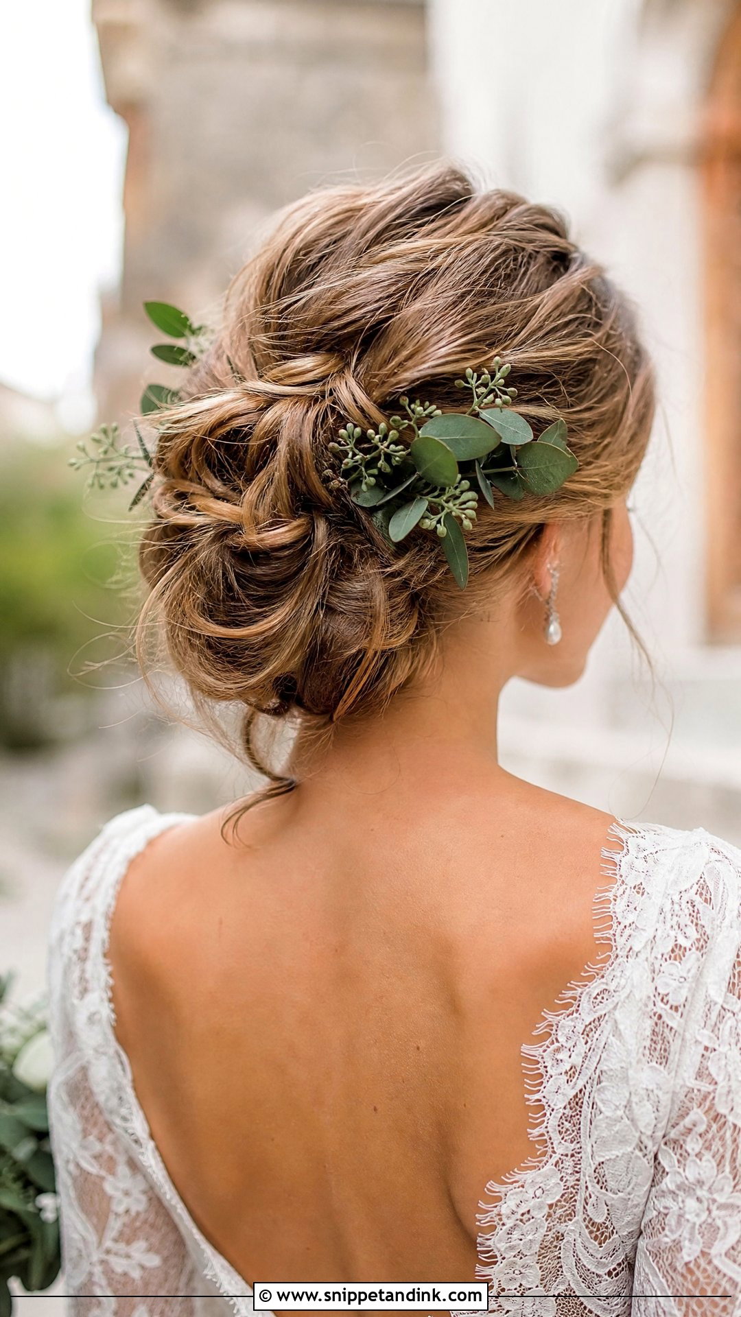 Romantic Messy Bun With Greenery - Snippet and Ink - 20 Messy Bridal Bun Ideas