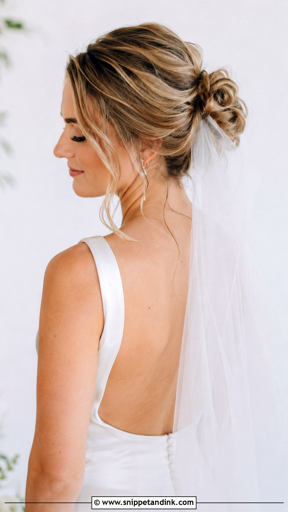 Romantic Messy Updo With Veil - Snippet and Ink - 25 Messy Wedding Hair Ideas
