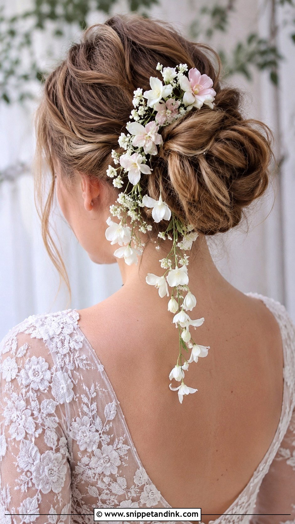 Romantic Updo With Trailing Flowers - Snippet and Ink - 25 Facinators Wedding Hairstyles