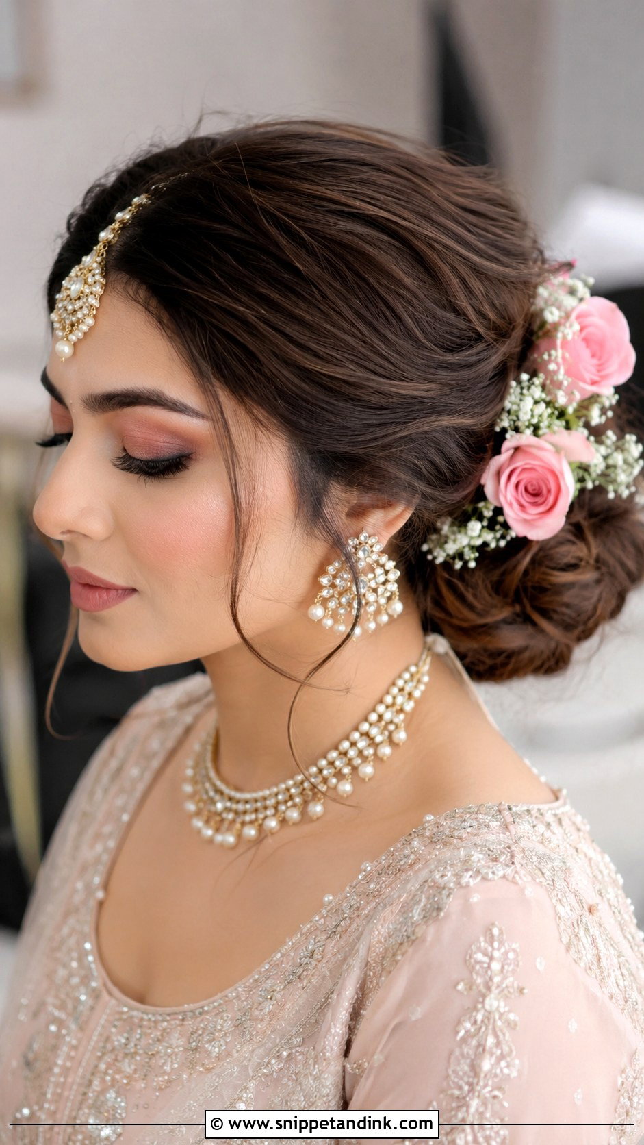 Rose Adorned Bun for Walima - Snippet and Ink - 20 Pakistani Bridal Hairstyles
