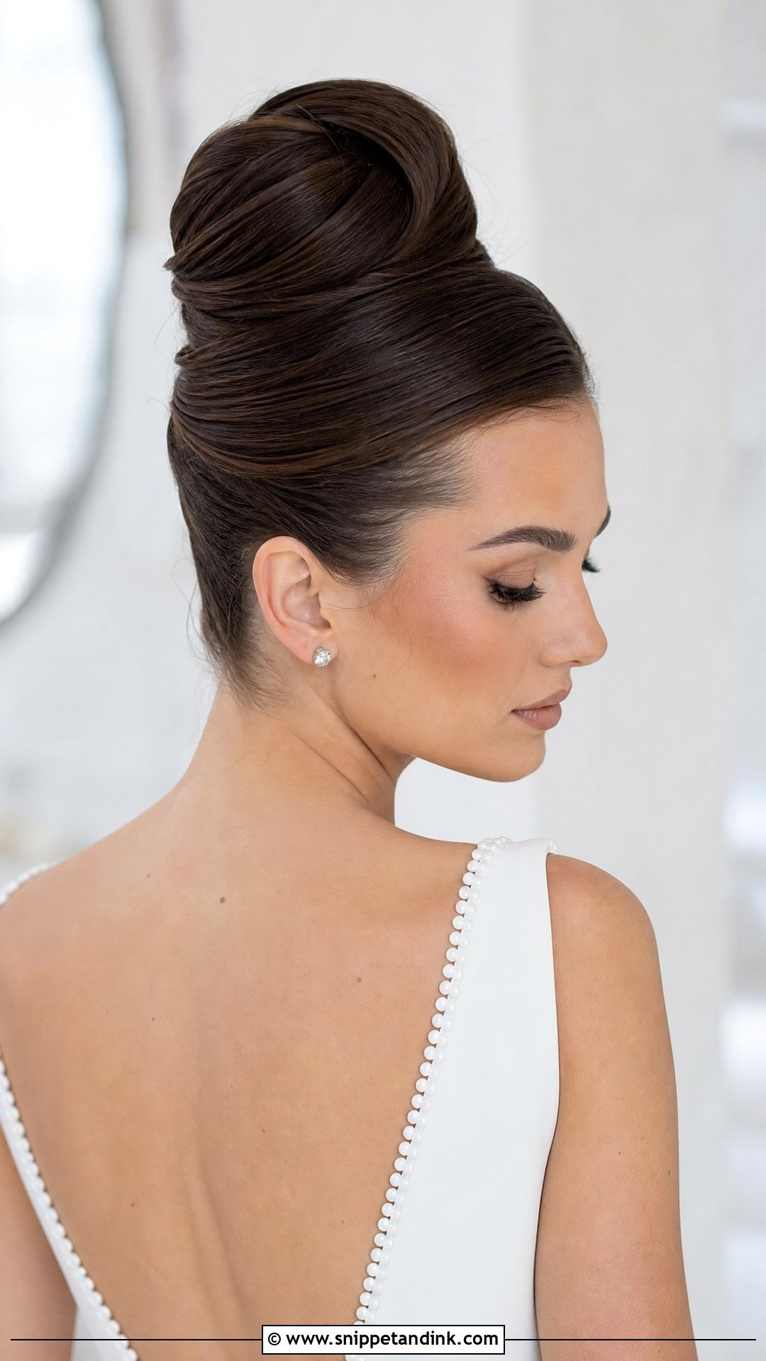Sculpted High Bun Updo - Snippet and Ink - 20 High Bun for Wedding Ideas