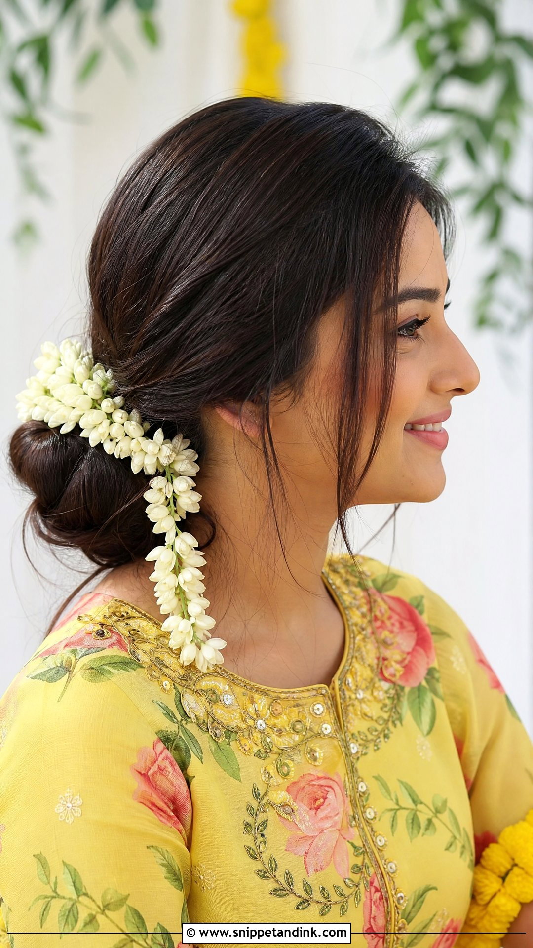 Side Bun With Hanging Jasmine - Snippet and Ink - 20 Hairstyle for Haldi Bride Ideas