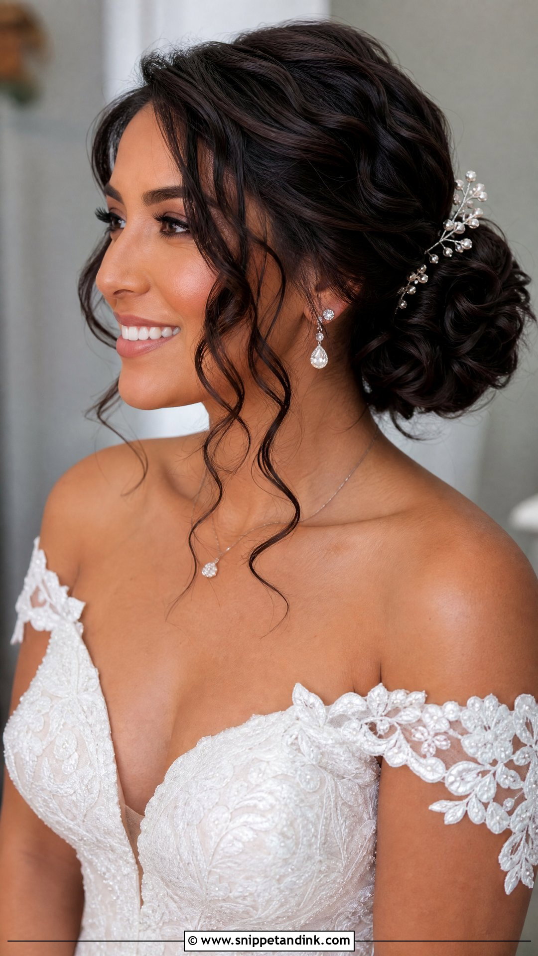Side Bun With Loose Curls - Snippet and Ink - 25 Side Bun Wedding Hair Ideas