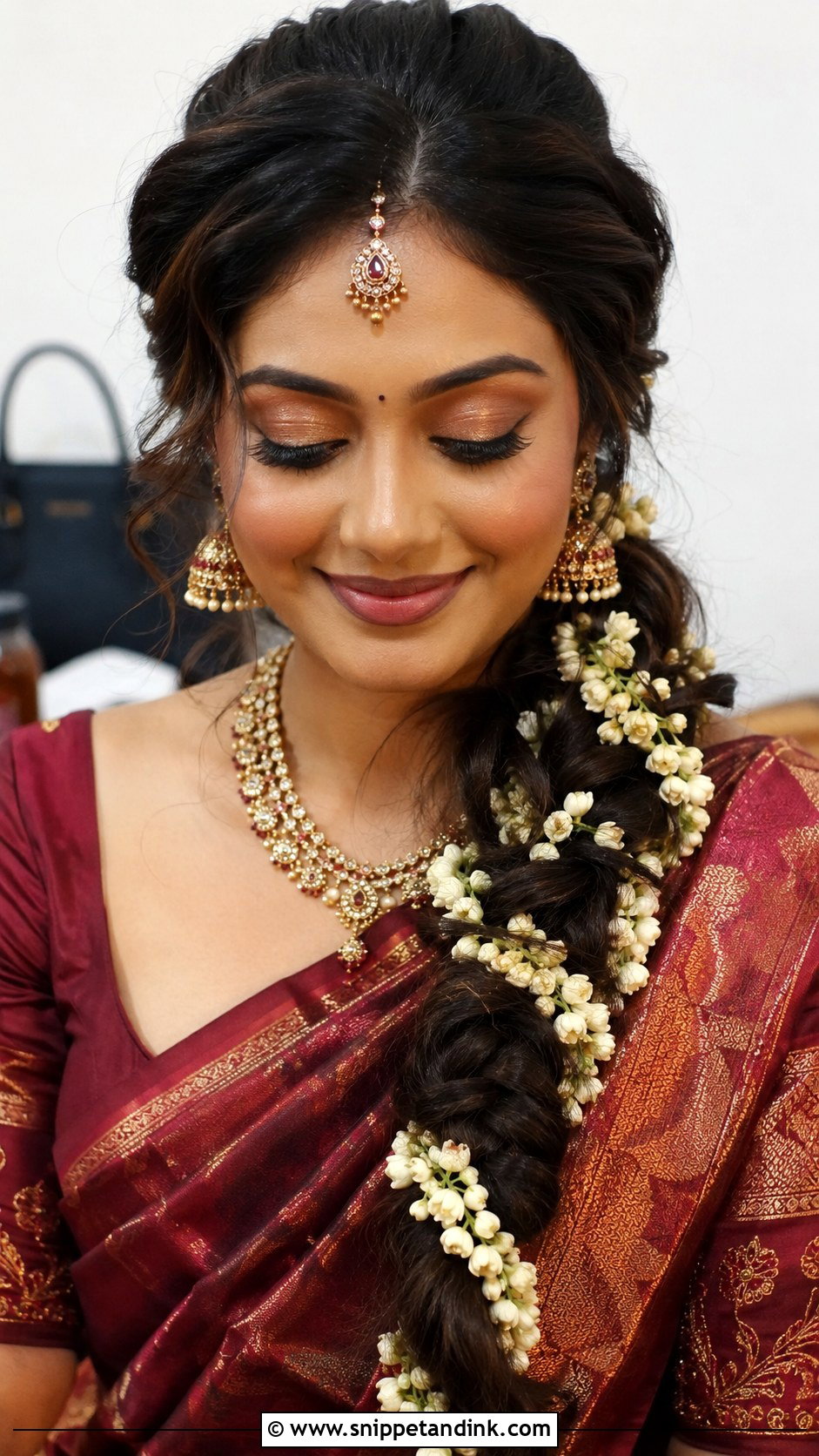 Side Swept Braid With Jasmine Strings - Snippet and Ink - 20 South Indian Bride Hairstyle with Jasmine Flowers
