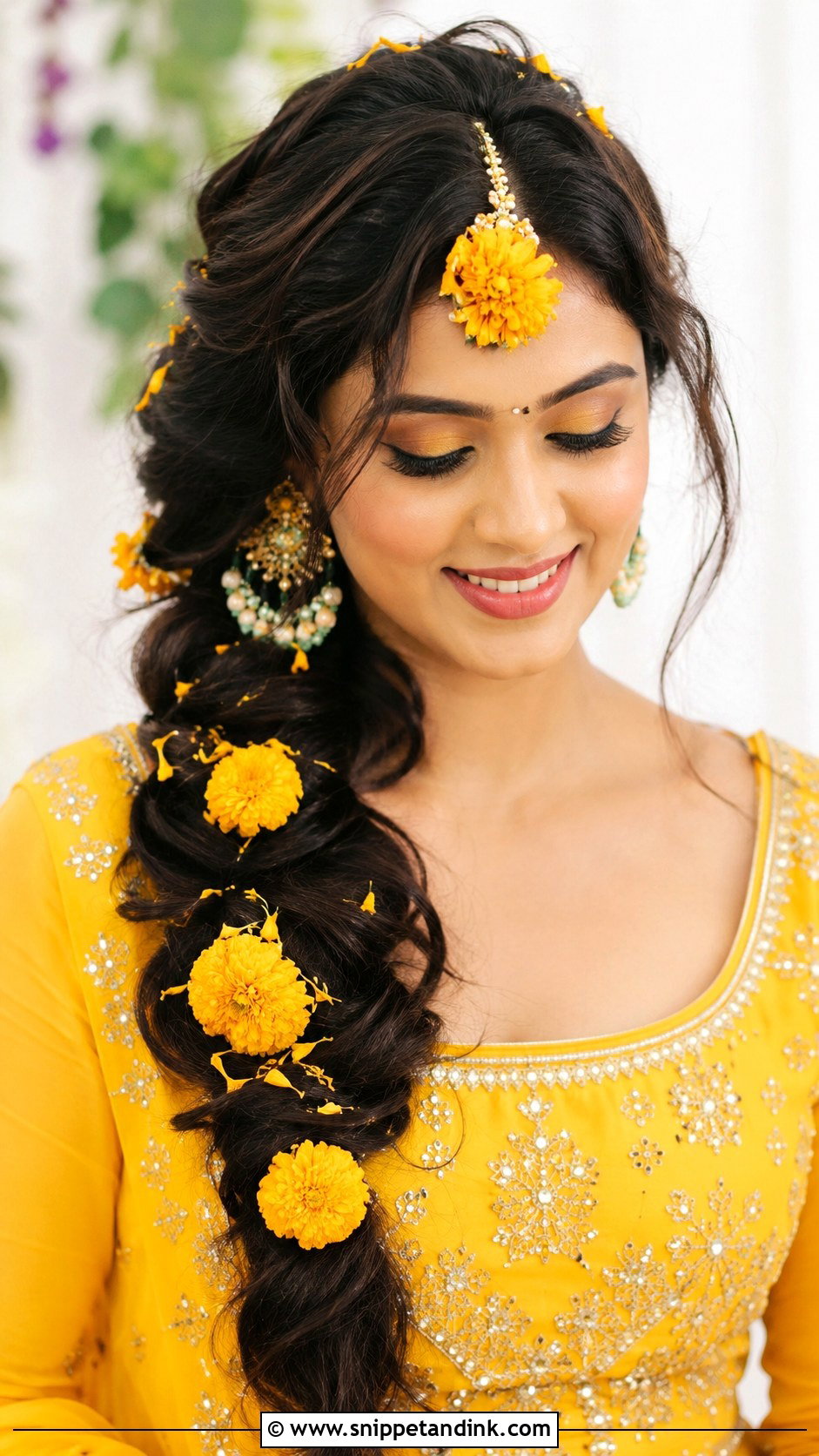Side Swept Braid With Marigolds - Snippet and Ink - 25 Haldi Ceremony Hairstyle for Bride Ideas