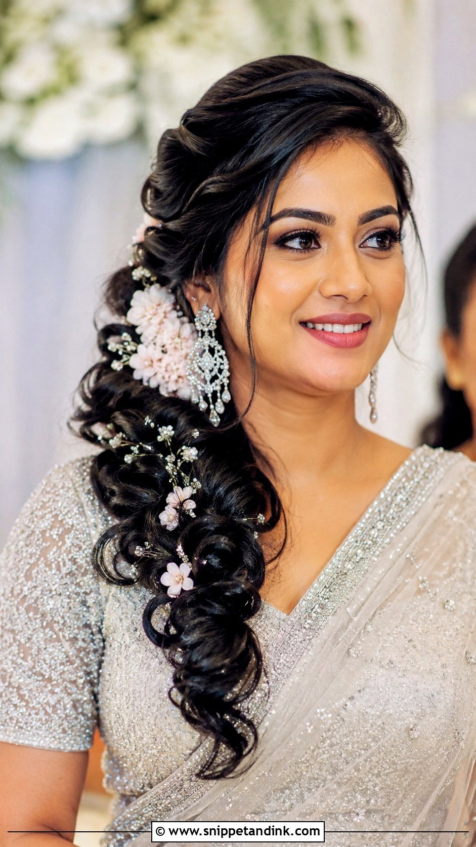 Side Swept Curls With Flowers - Snippet and Ink - 25 Indian Wedding Hairstyles for Long Hair