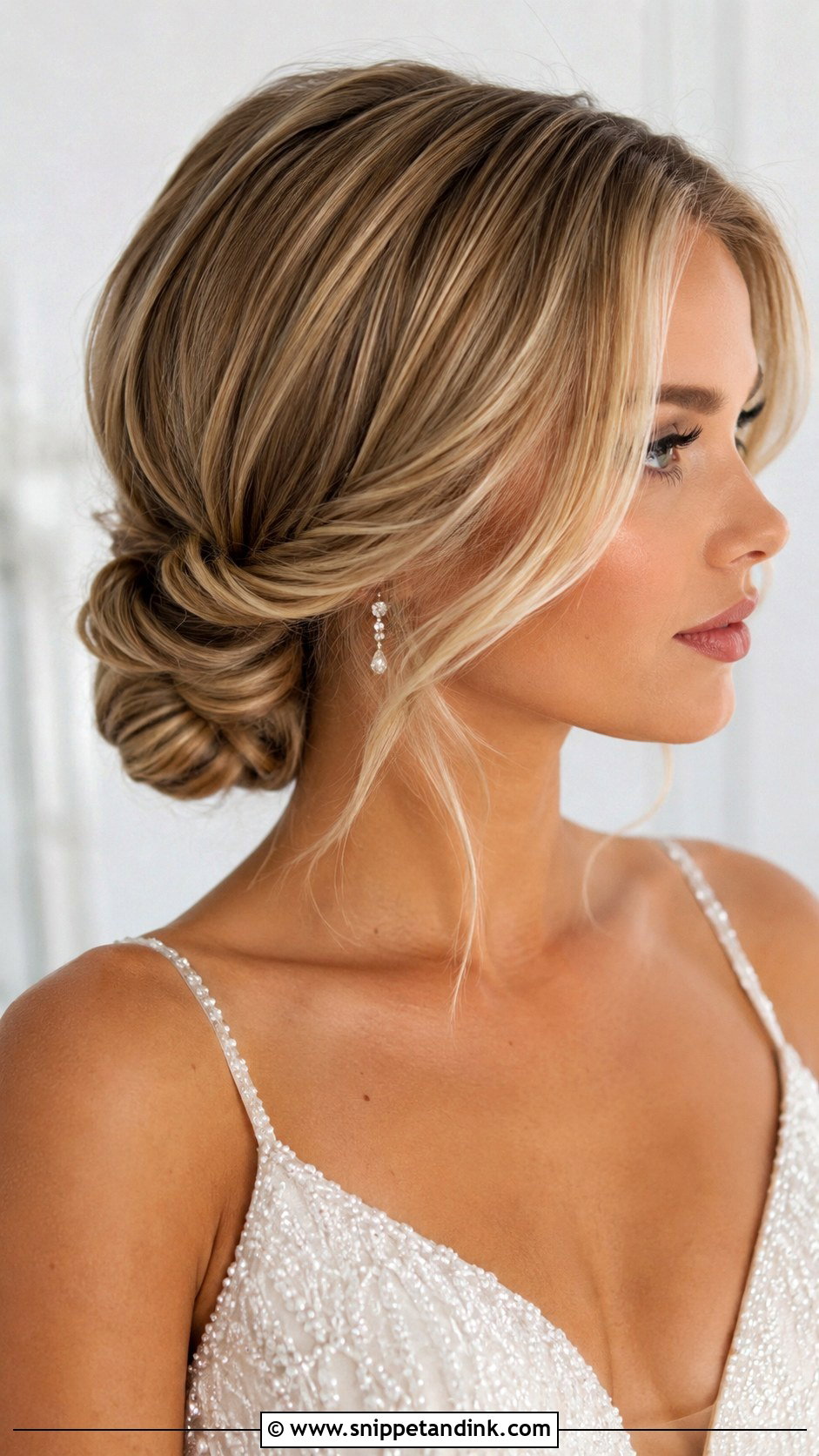 Side Swept Low Bun - Snippet and Ink - 30 One Sided Wedding Hairstyle Ideas