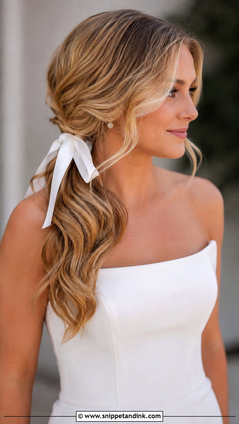 Side Swept Low Ponytail With Bow - Snippet and Ink - 30 Side Wedding Hairstyles