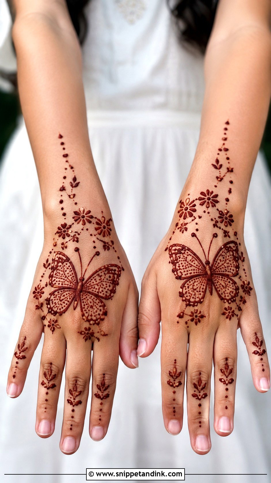 Simple Butterfly Back Hand Mehndi Design for Kids - Snippet and Ink - 30 Very Easy Mehndi Designs for Kids