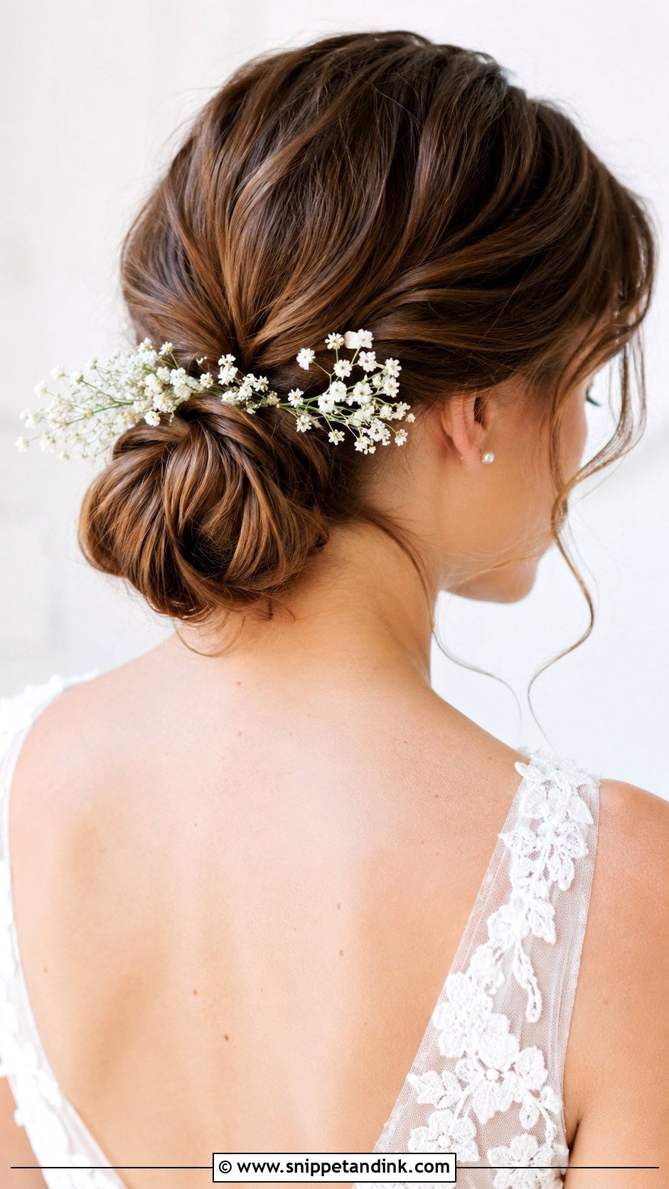 Simple Low Bun With Babys Breath - Snippet and Ink - 25 Simple Low Bun Wedding Hair Ideas