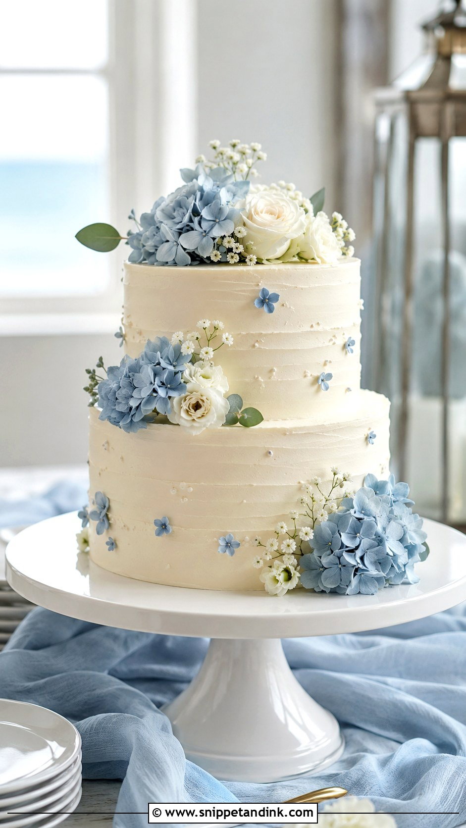 Simple Two Tier Wedding Cake With Blue Flowers - Snippet and Ink - 30 Simple Two Tiered Wedding Cakes