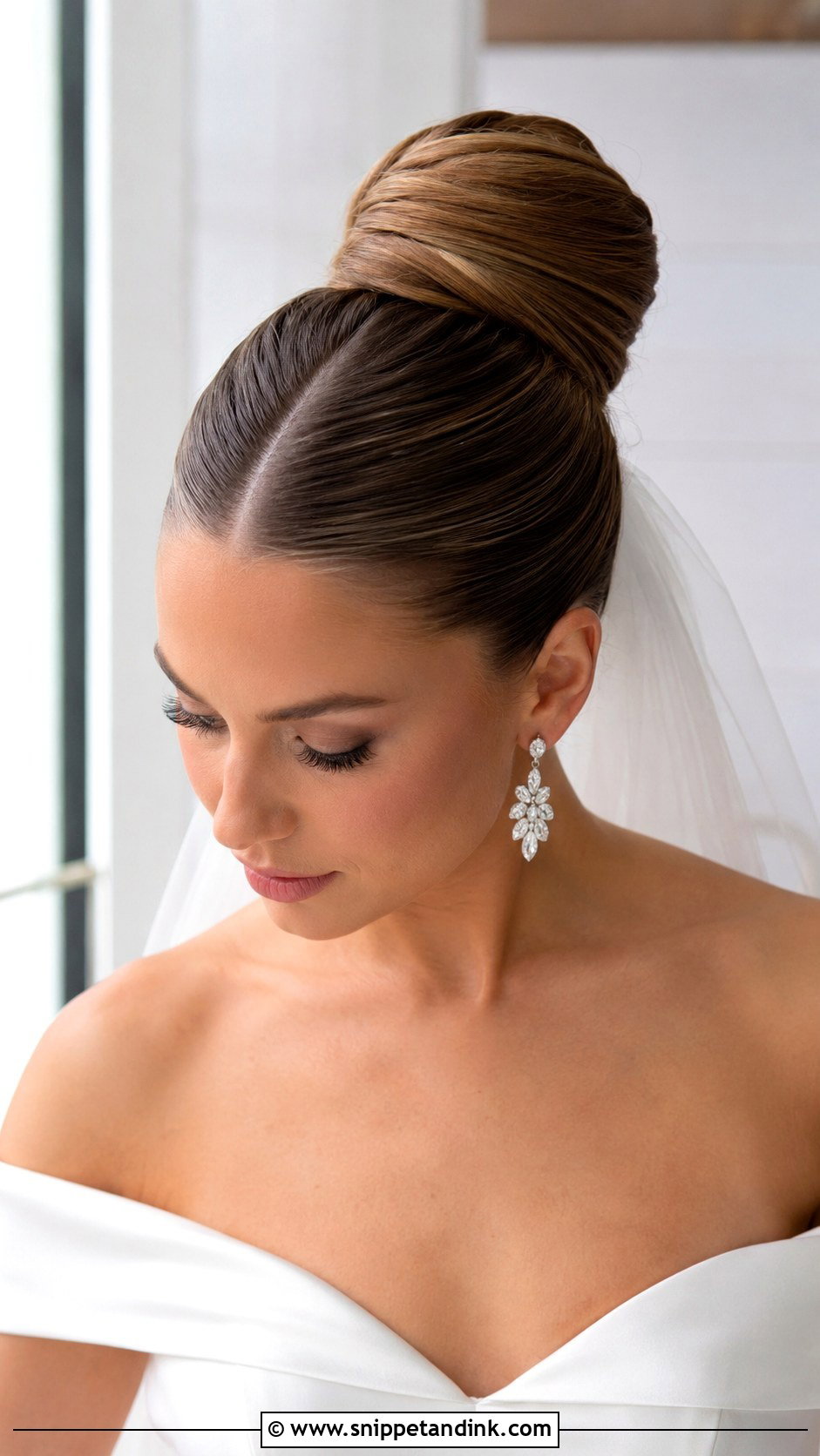 Sleek Ballerina Bun - Snippet and Ink - 20 Simple Updo Wedding Hairstyles