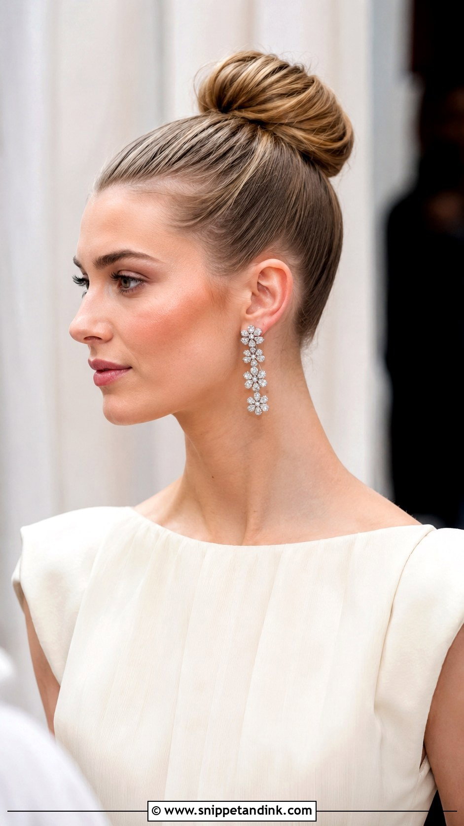 Sleek Ballerina Bun - Snippet and Ink - 25 Mother of the Bride Hair Updo Ideas