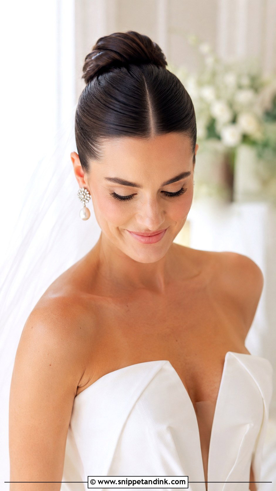 Sleek Ballerina Bun With Center Part - Snippet and Ink - 25 Easy Hairstyles for Long Hair Wedding