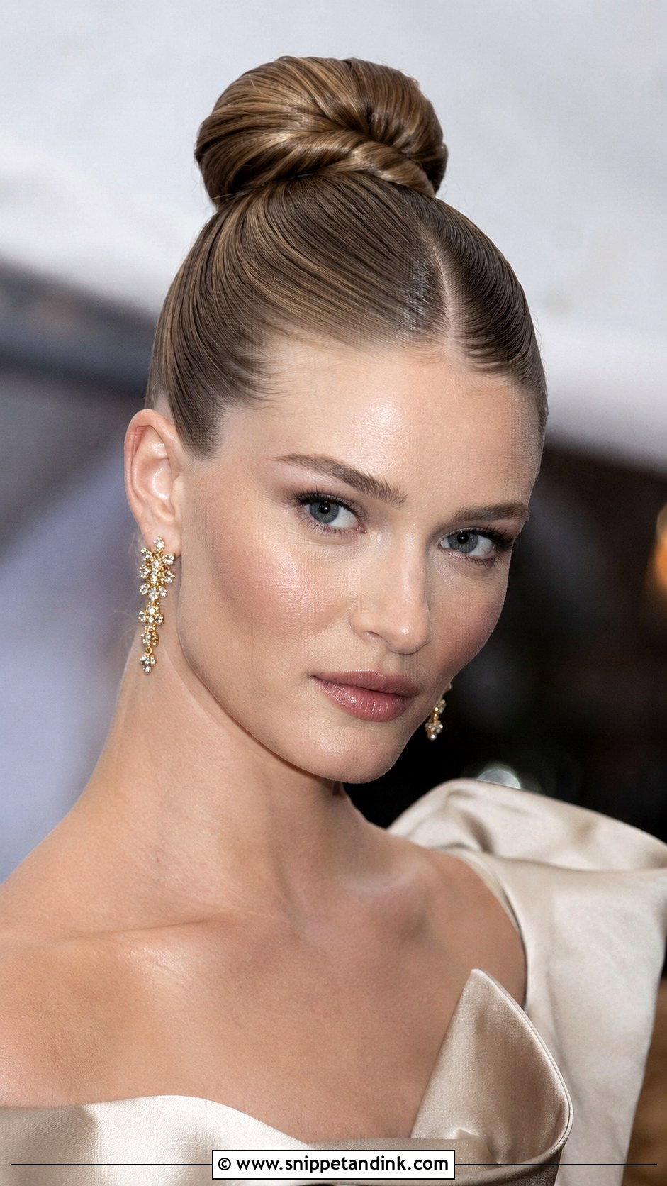 Sleek Ballerina Bun With Center Part - Snippet and Ink - 25 Hair Up Dos for Weddings