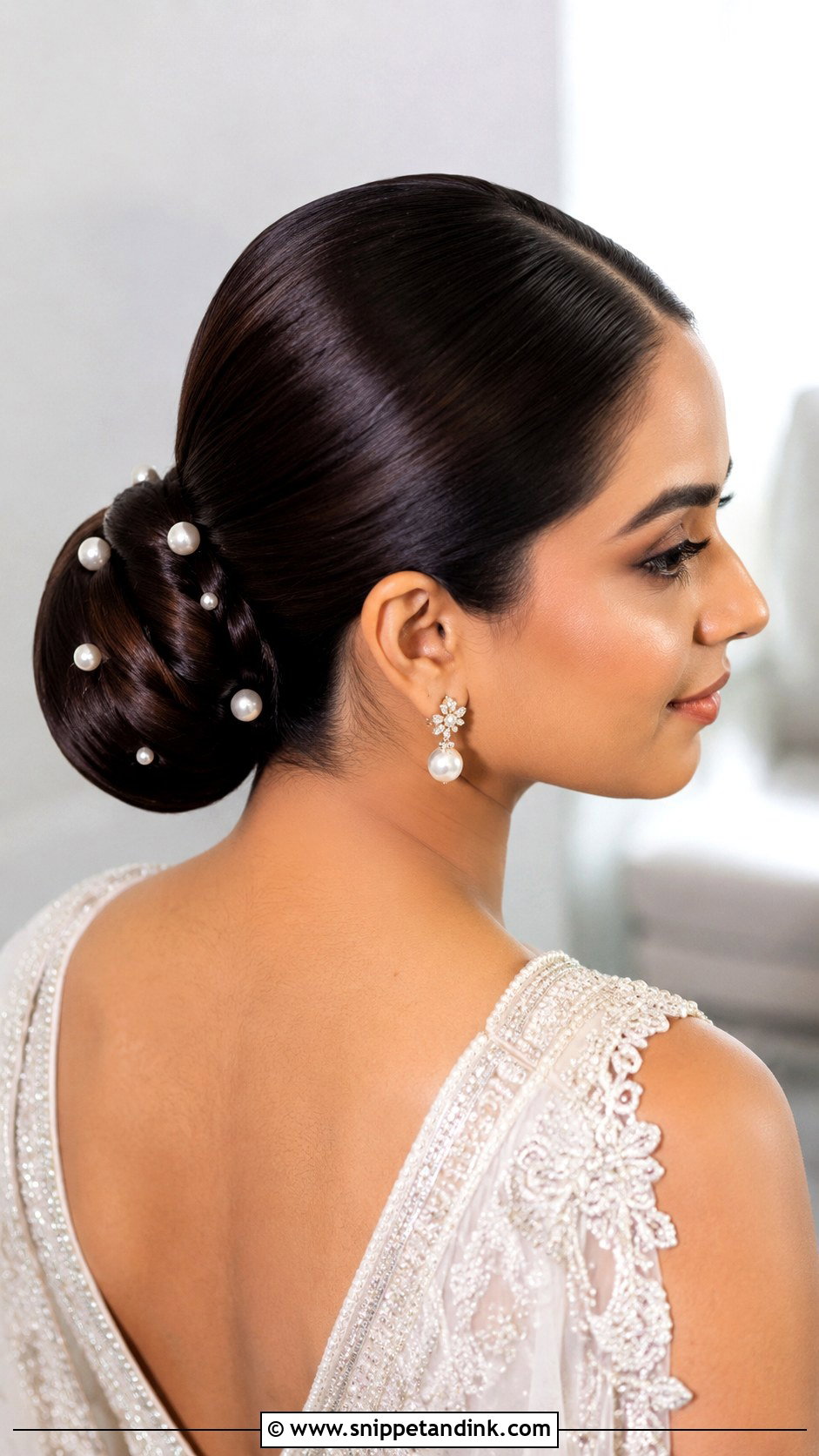 Sleek Bridal Bun With Pearls - Snippet and Ink - 15 Sleek Bridal Hairstyles